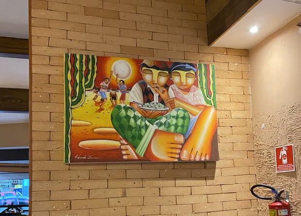 Quadro de inspiração cordelista na parede do Barnabé